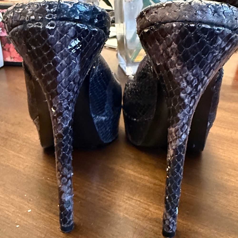 Vera Wang Lavender Snakeskin Platform Heels
5” slightly over heel - Picture 6 of 6